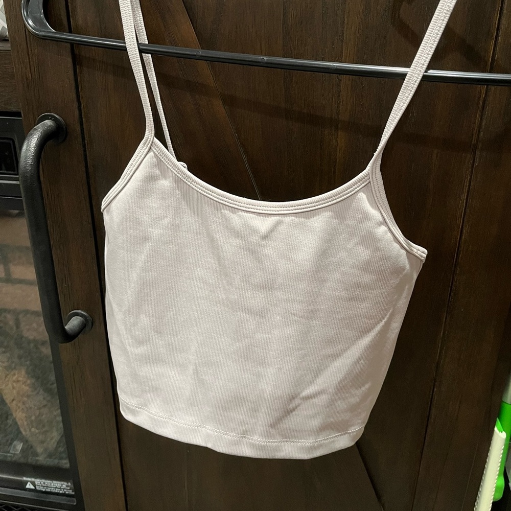 Tan balance athletics crop top. Never worn. Mint condition.